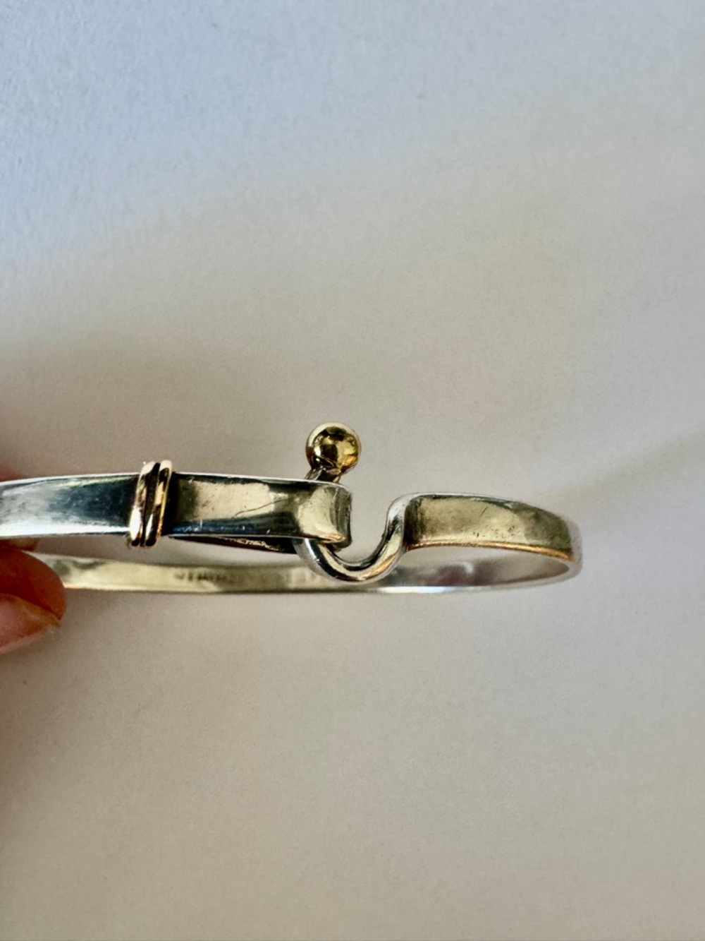 Tiffany Hook and Eye bracelet in silver with gold accents - a timeless classic.